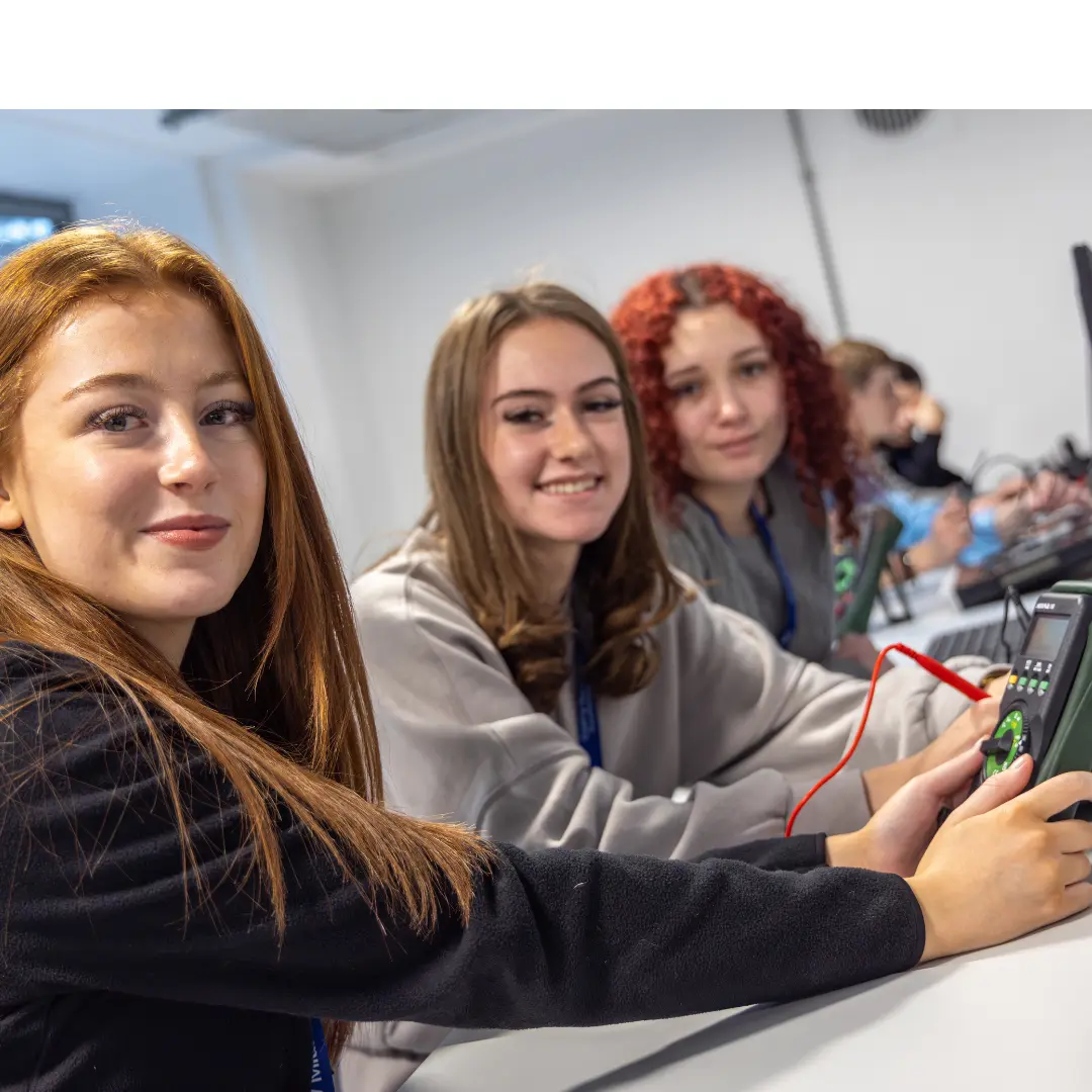 Students smiling at the camera