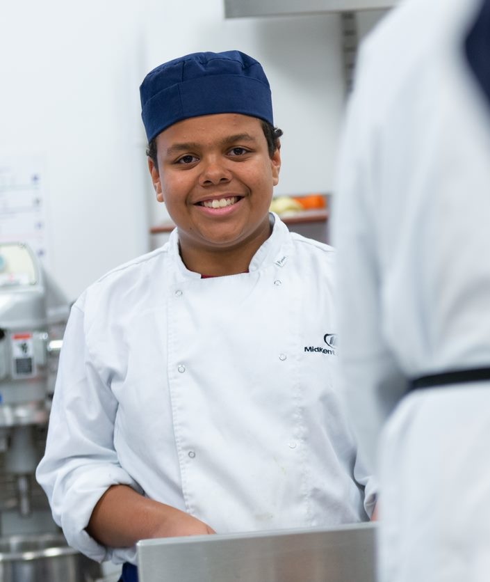 Riley in chef's whites