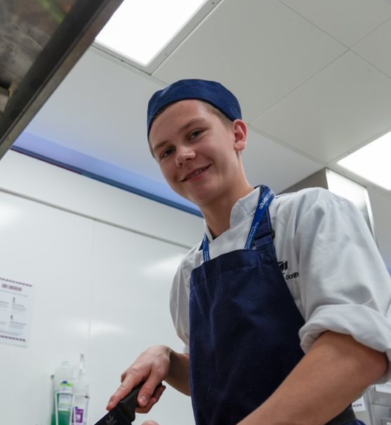 Jack practising in training kitchen