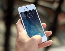 Someone holding a mobile phone